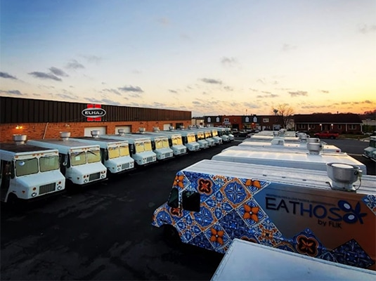 view of the food truck lot at Elhaj Custom Food Trucks & Trailers